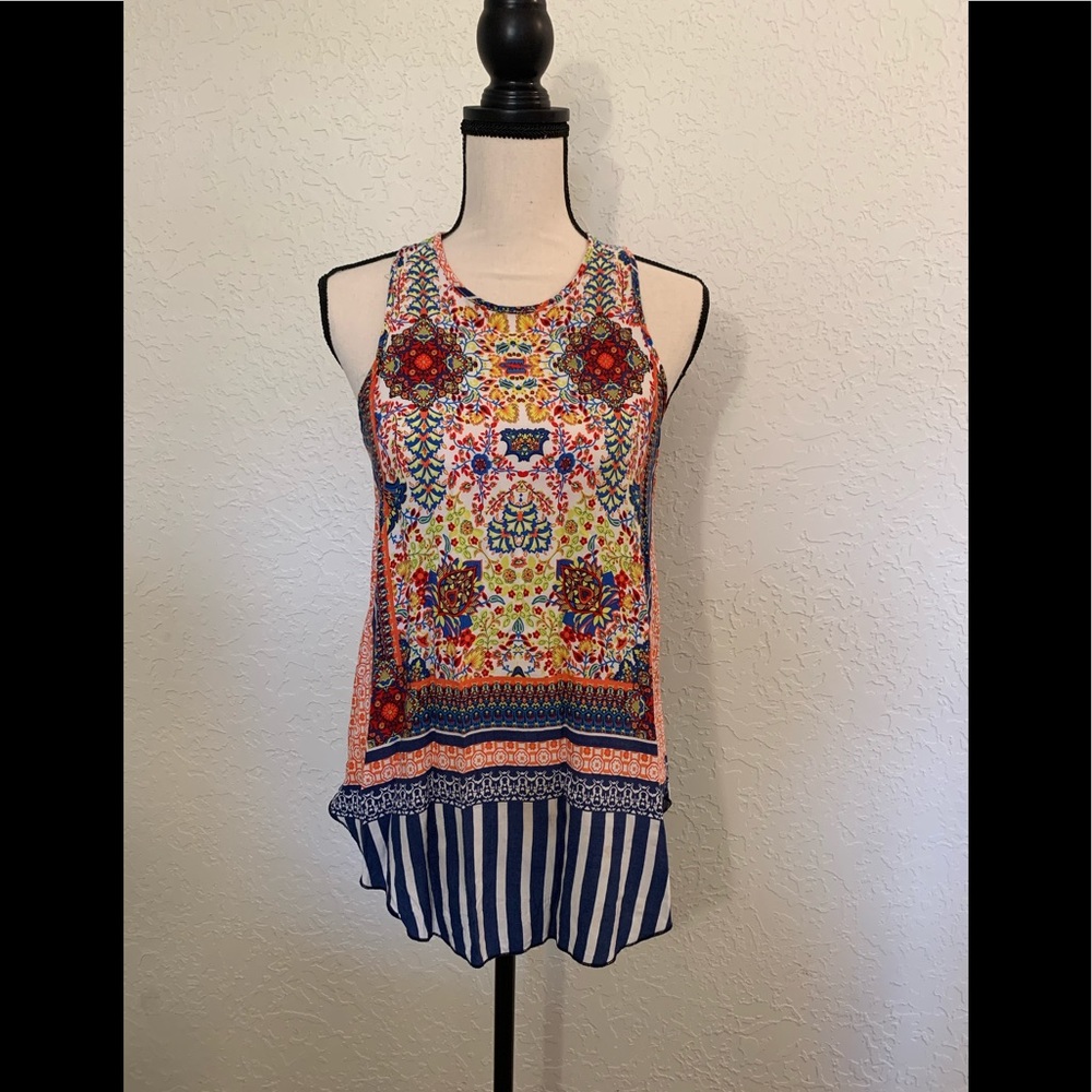 Renee C. Flowing tank.
